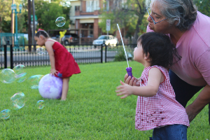 Child blowing bubbles